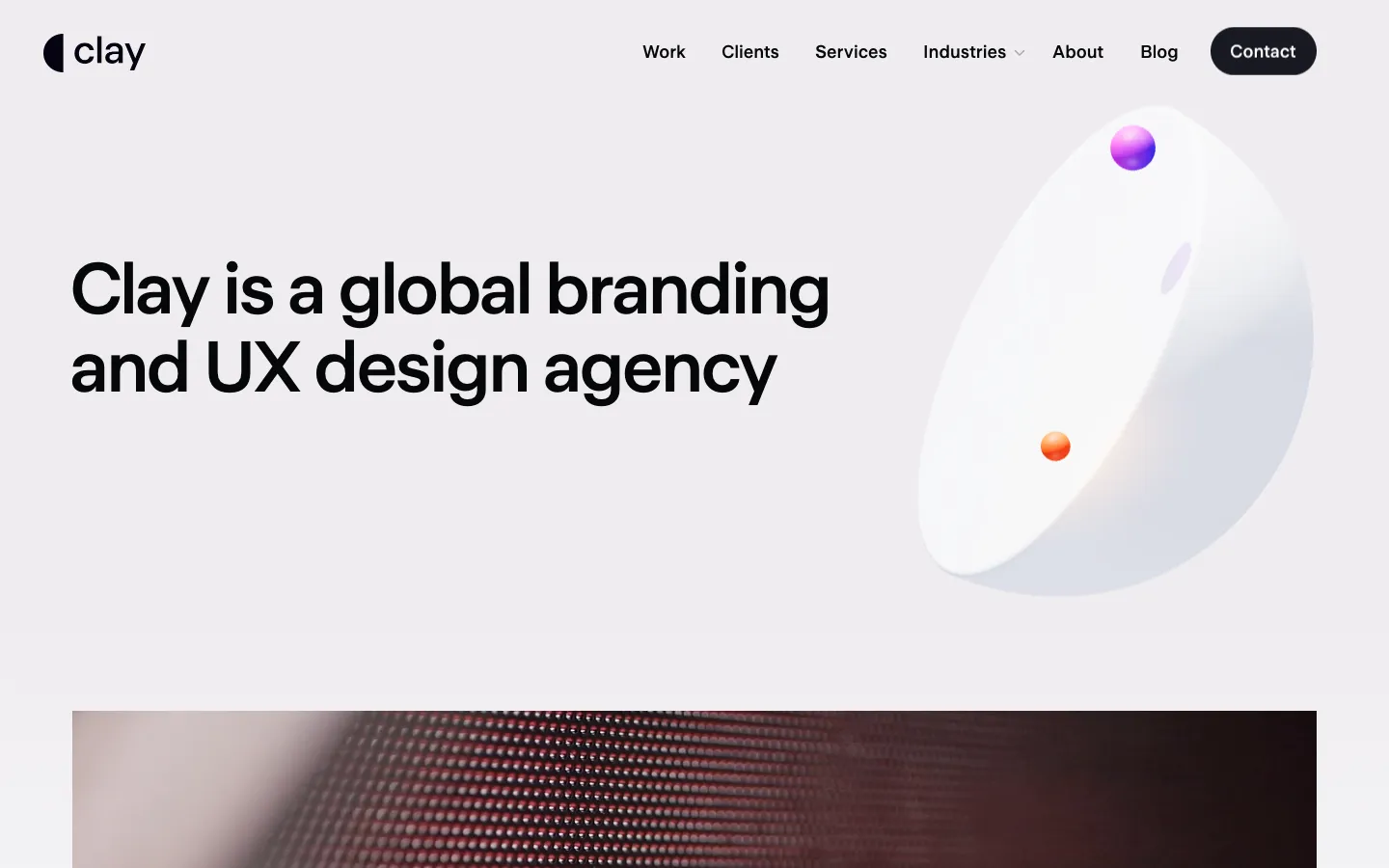 Clay homepage: the headline Clay is a global branding and UX design agency next to a white bowl shape with a purple and an orange ball.