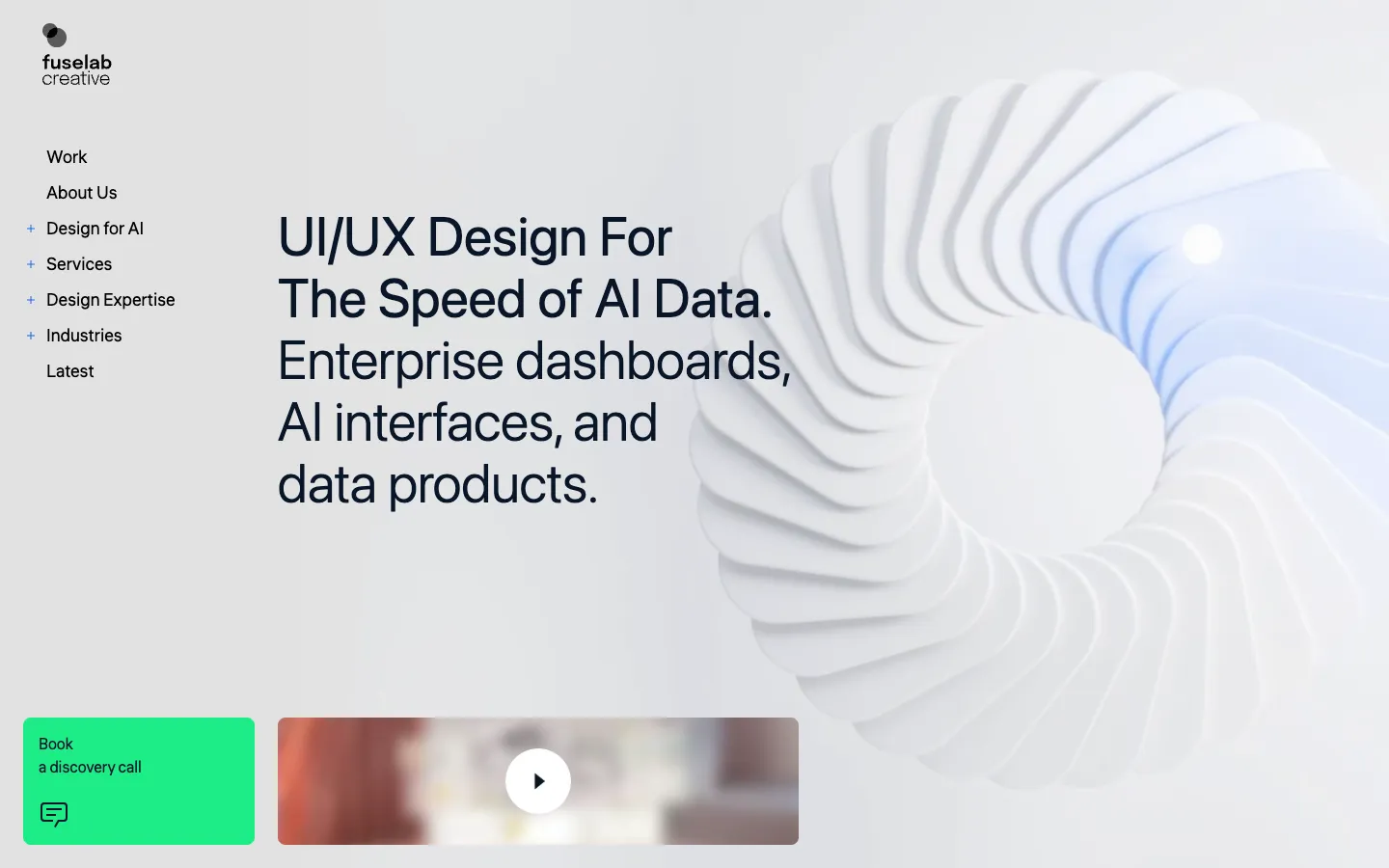 Fuselab Creative homepage: the headline UI/UX Design For The Speed of AI Data next to a white spiral shape, with a green Book a discovery call box.