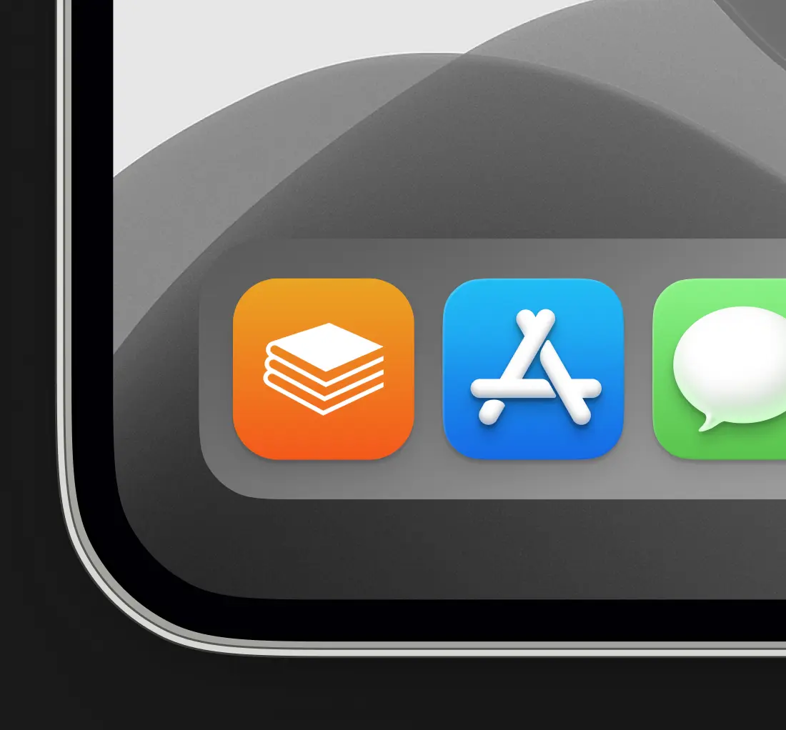 The app icon, an orange tile with a white stack of book pages, in a dock beside the App Store and Messages icons.