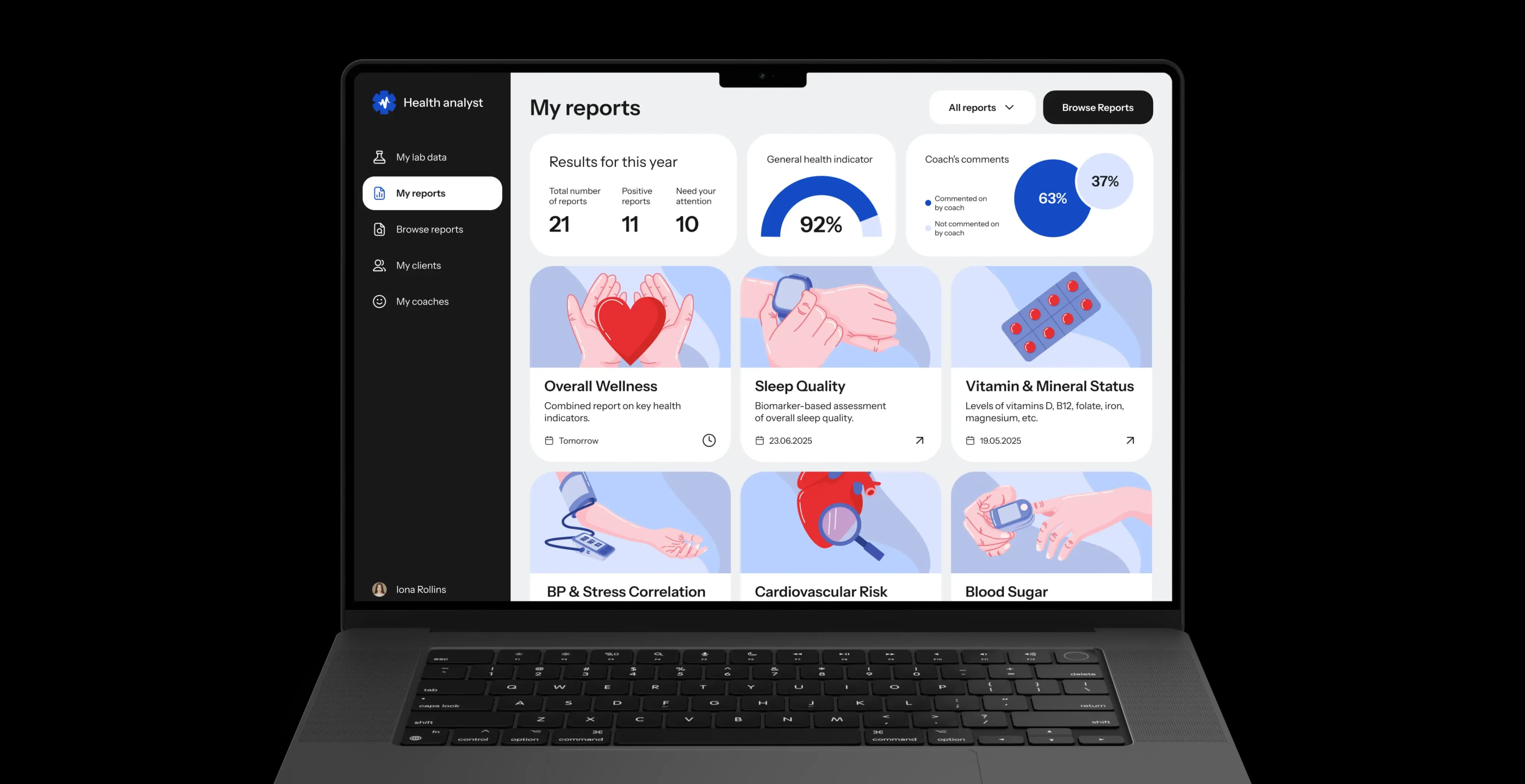Laptop showing the My reports screen with report cards for overall wellness, sleep quality, cardiovascular risk and blood sugar.