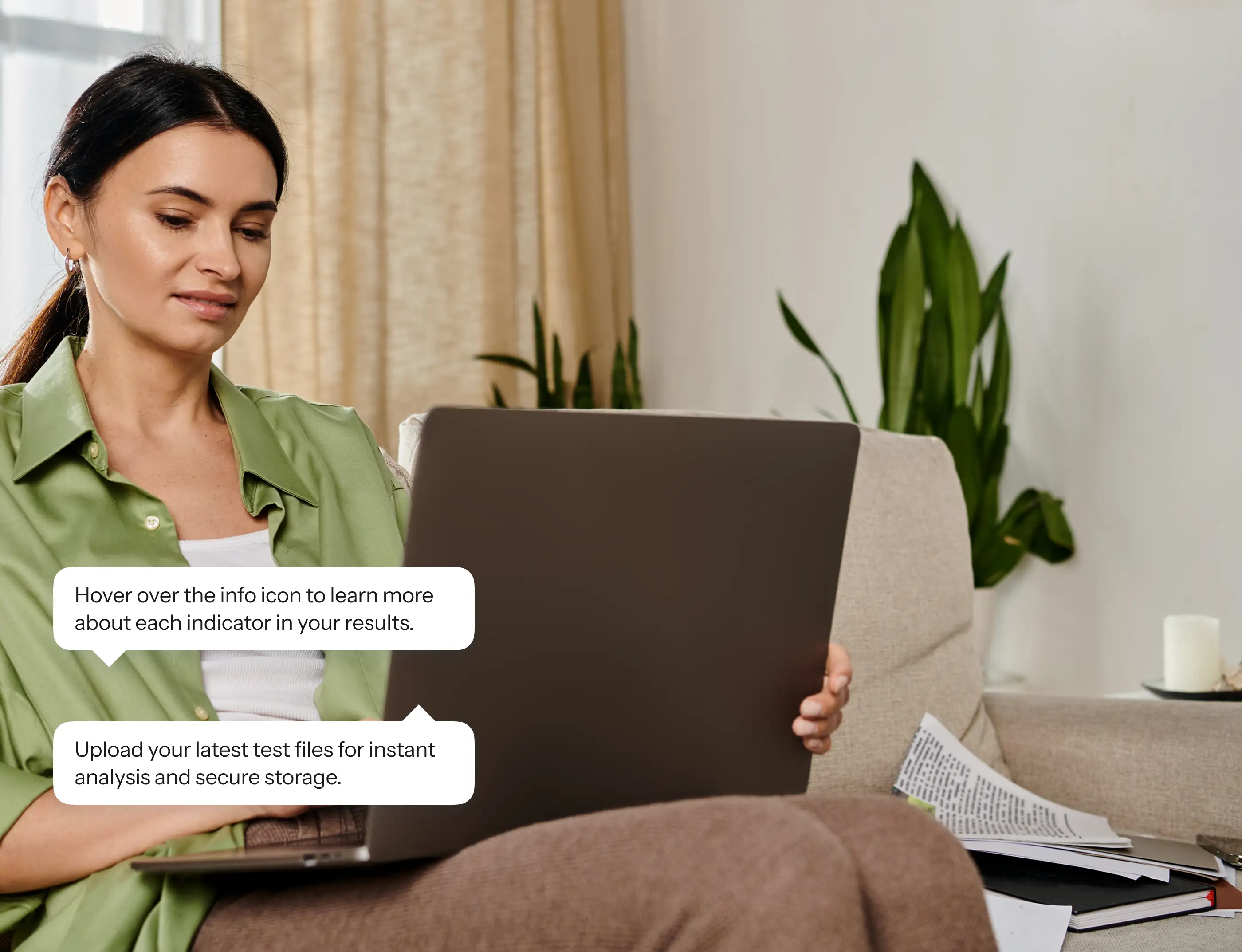 Laptop user with app tooltips: hover the info icon for indicator details; upload test files for analysis and secure storage.